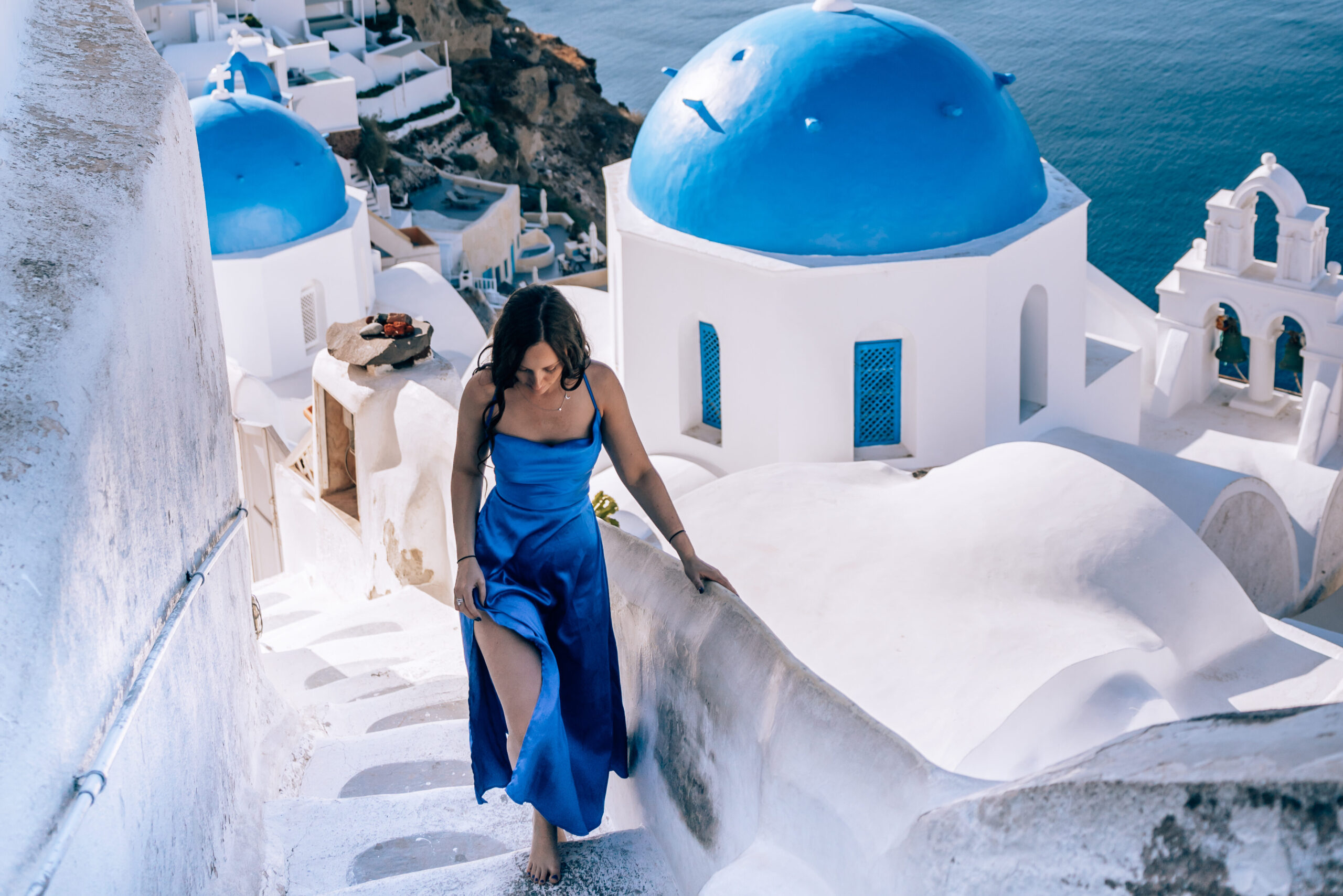 Blue domes and white buildings in Santorini Greece