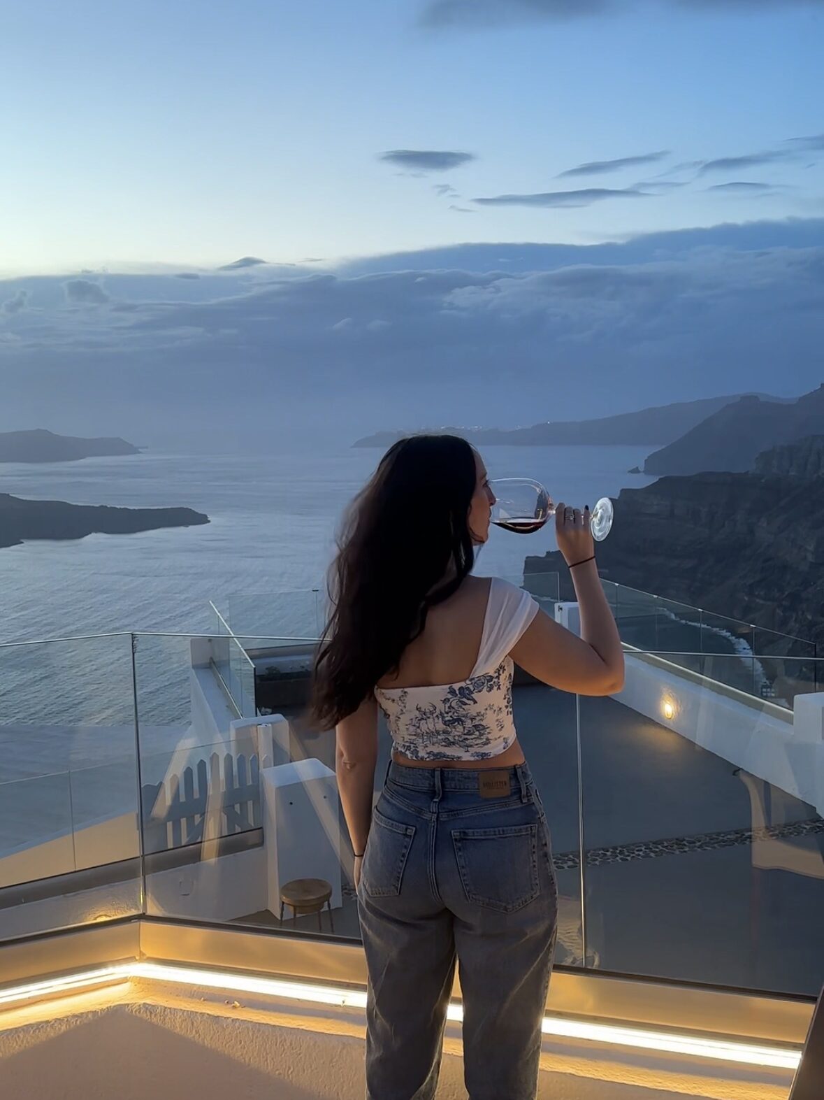 Sipping red wine at Santo Winery in Santorini